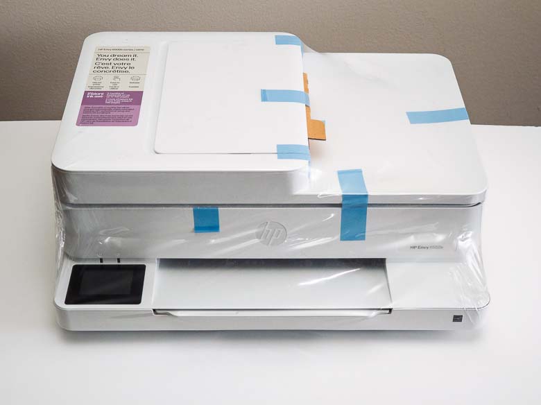 HP-Envy6500-Printer covered in packing tape