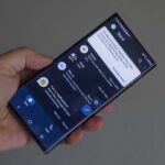 Photo of a smartphone running the Signal app.